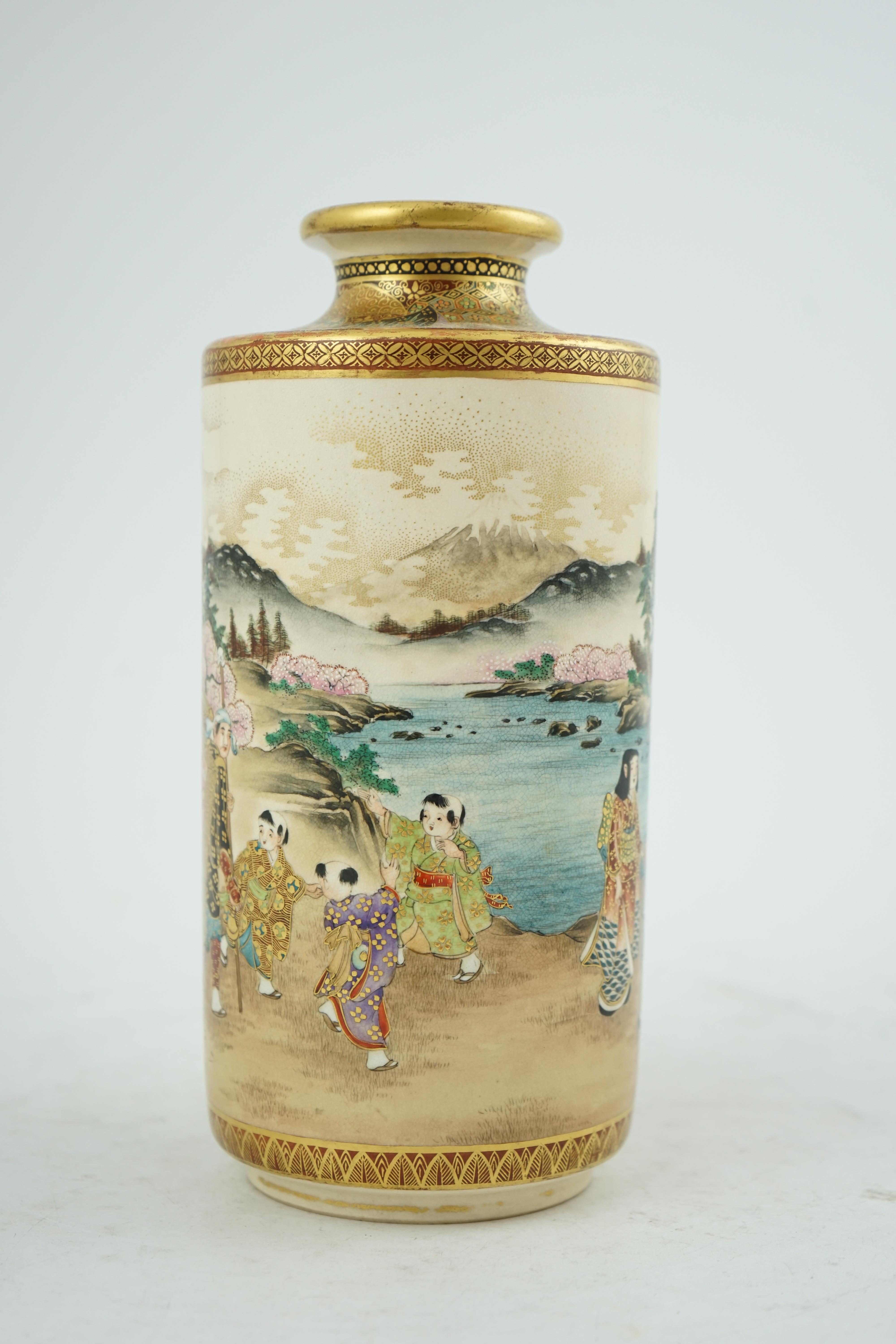 A Japanese Satsuma ‘Spring festival’ cylindrical vase, Meiji period